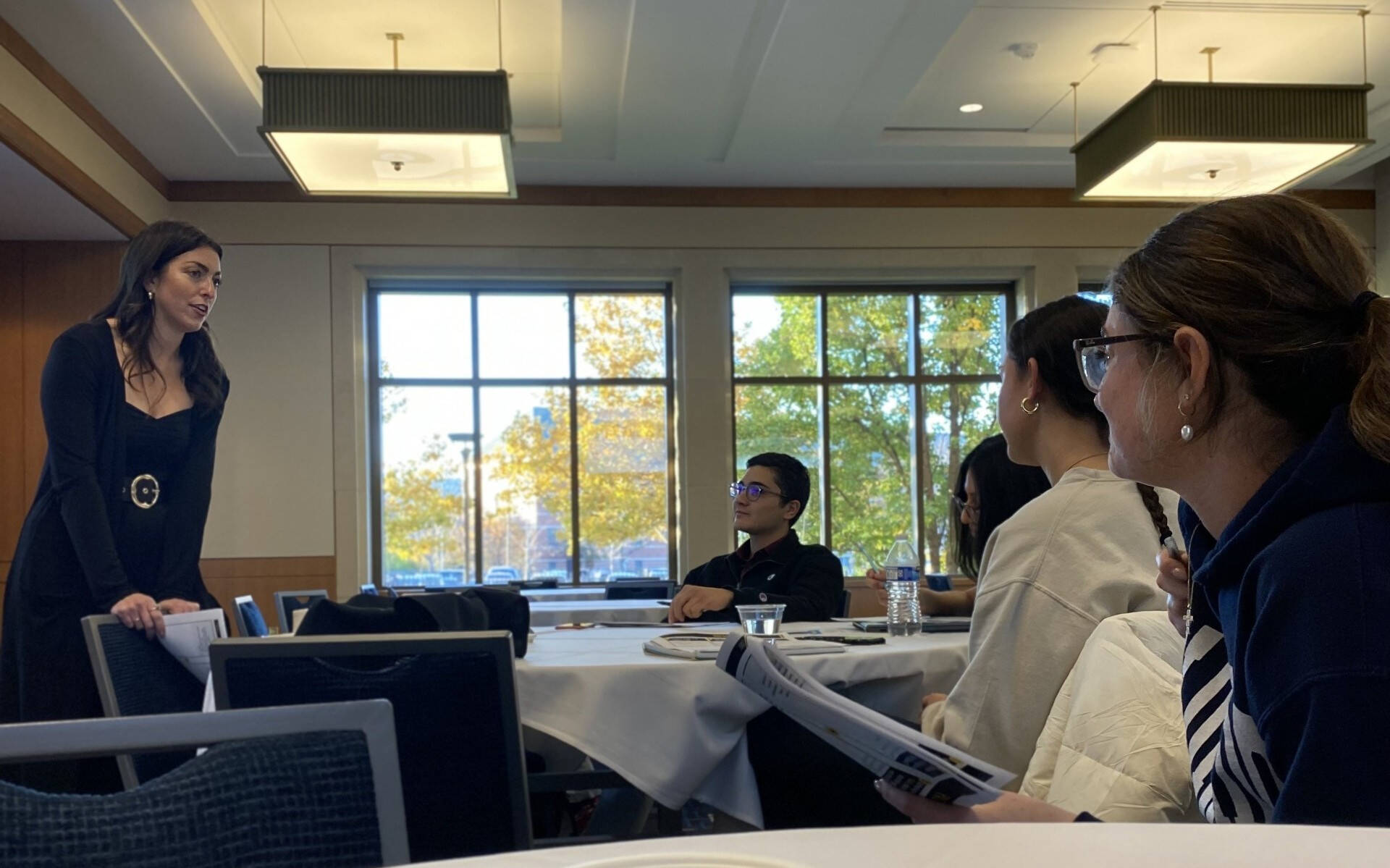 Students participating in discussion during the ideation process for Idea Sprint.